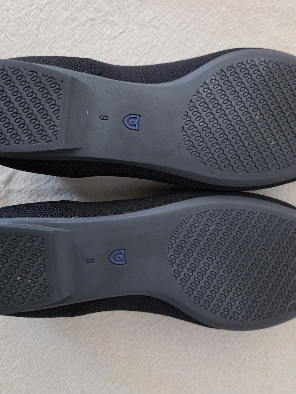 Rothy's Women's Black Knit Slip-Ons with Tan Trim - Picture 3 of 3